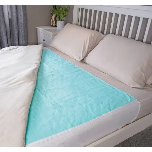 Alèse de lit réutilisable avec rabats – Protection efficace et durable pour un confort optimal - Dimensions : 85 x 135 cm - Taux absorption: 1600 mL - Conditionnement : 1 lot de 2